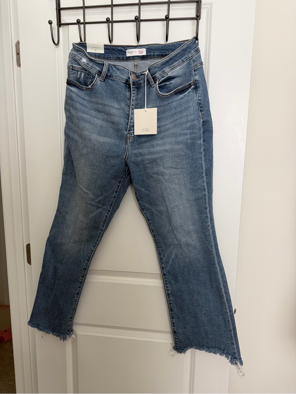 Boot Cut Mid-Rise Blue Jeans with Raw Hem